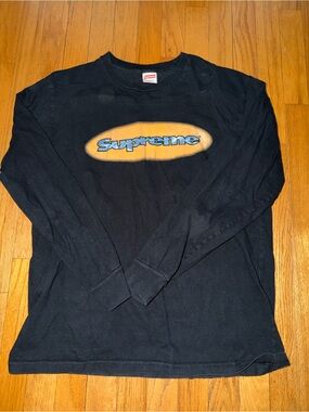 Supreme Black Long Sleeve Tee with Orange Oval and Blue Logo